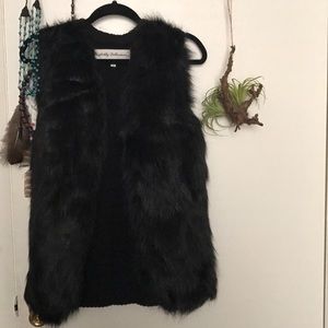 Black furry vest
